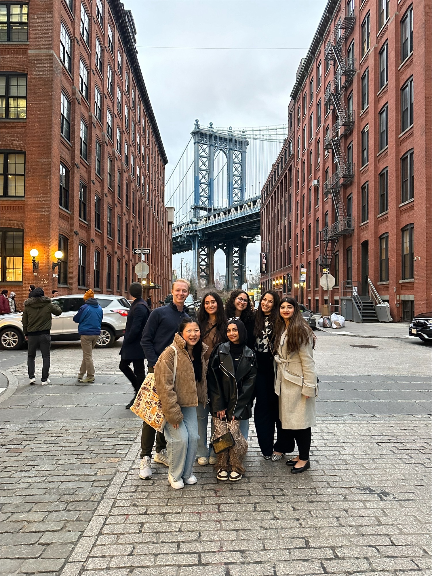 Quinlan Ramble students pose for a photo in front of the Brooklyn Bridge in New York.